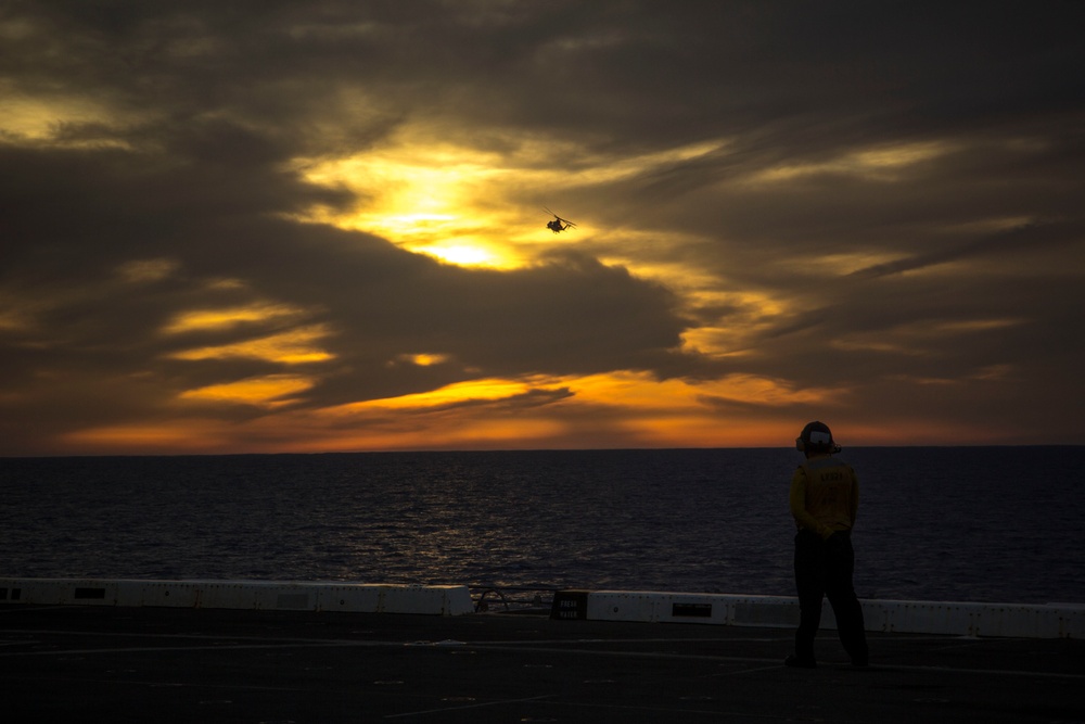 Sunset flight operations aboard the USS New York