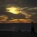 Sunset flight operations aboard the USS New York