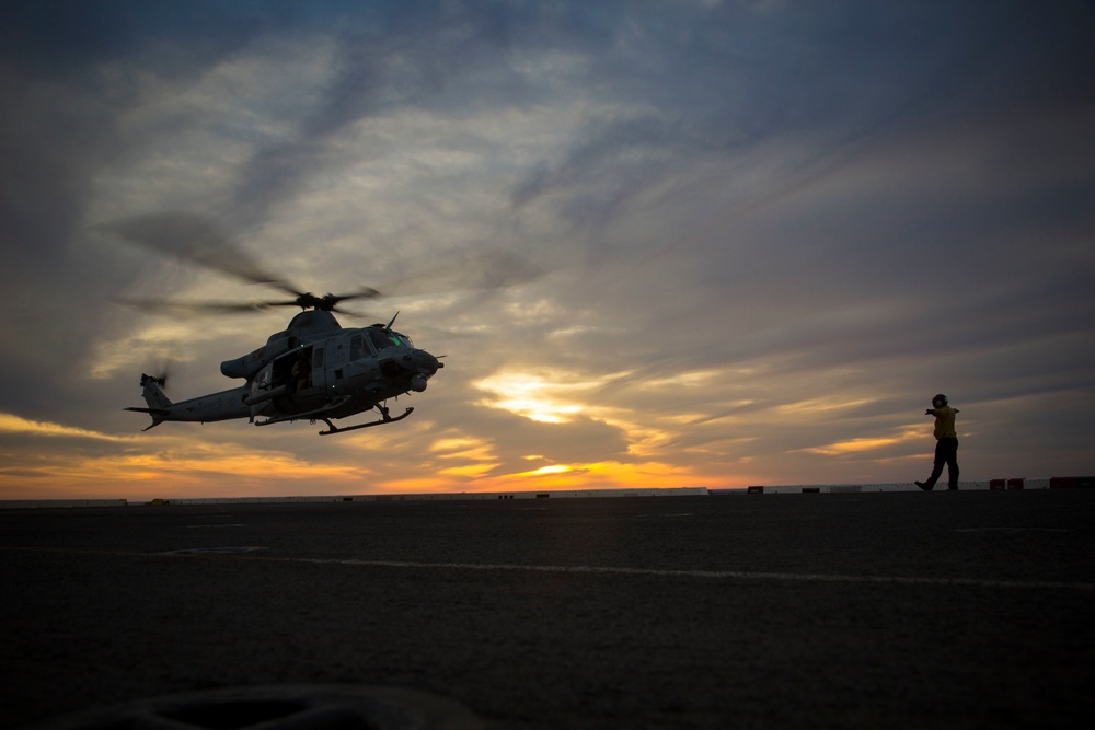 Sunset flight operations aboard the USS New York