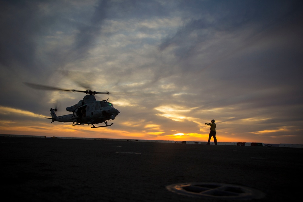 Sunset flight operations aboard the USS New York