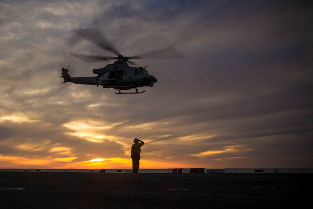 Sunset flight operations aboard the USS New York