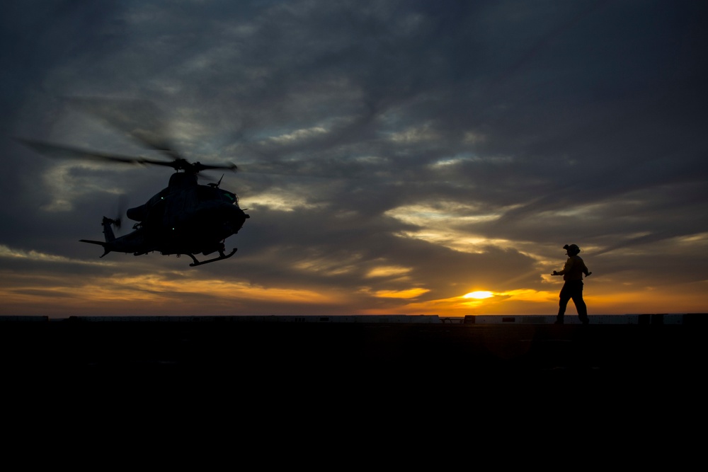 Sunset flight operations aboard the USS New York