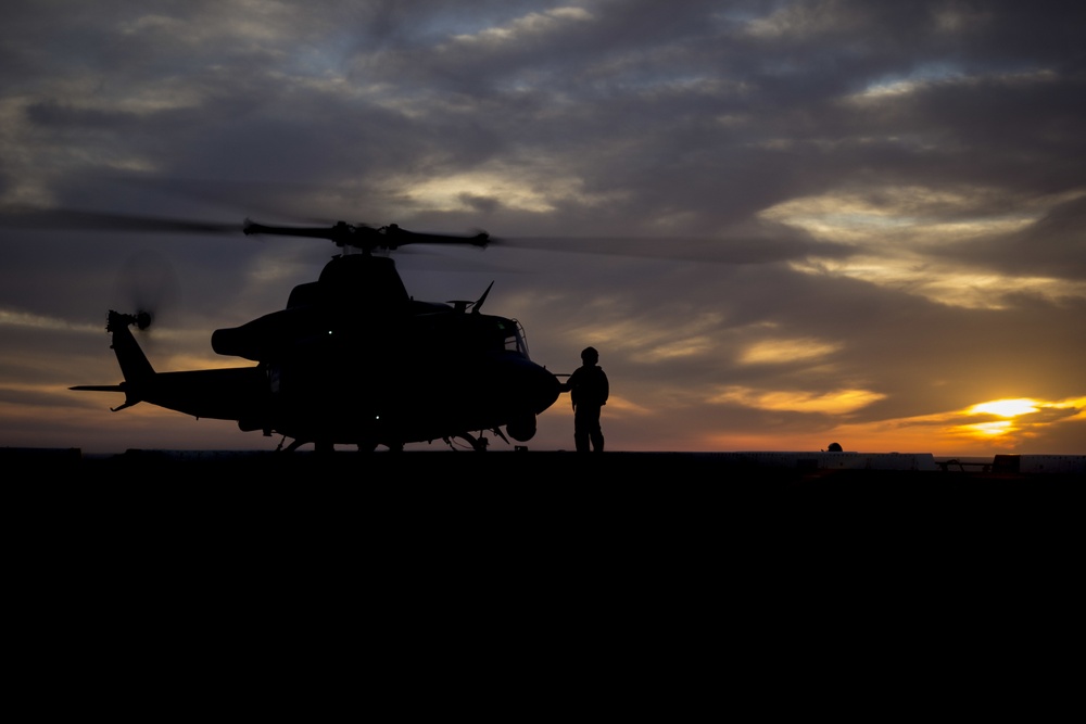 Sunset flight operations aboard the USS New York