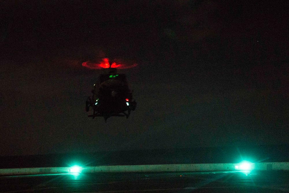 Sunset flight operations aboard the USS New York