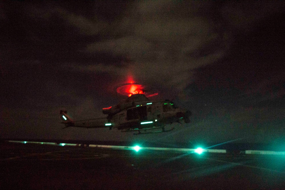 Sunset flight operations aboard the USS New York