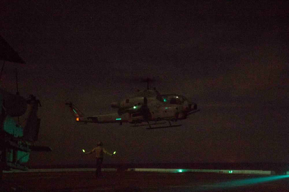 Sunset flight operations aboard the USS New York