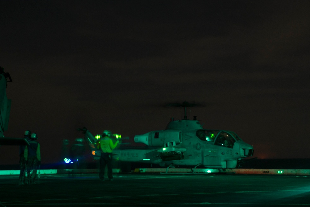 Sunset flight operations aboard the USS New York