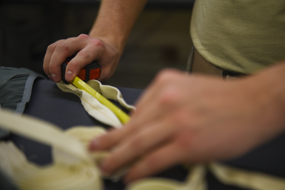 DVIDS Images Parachute packers ensure a safe and sustained landing