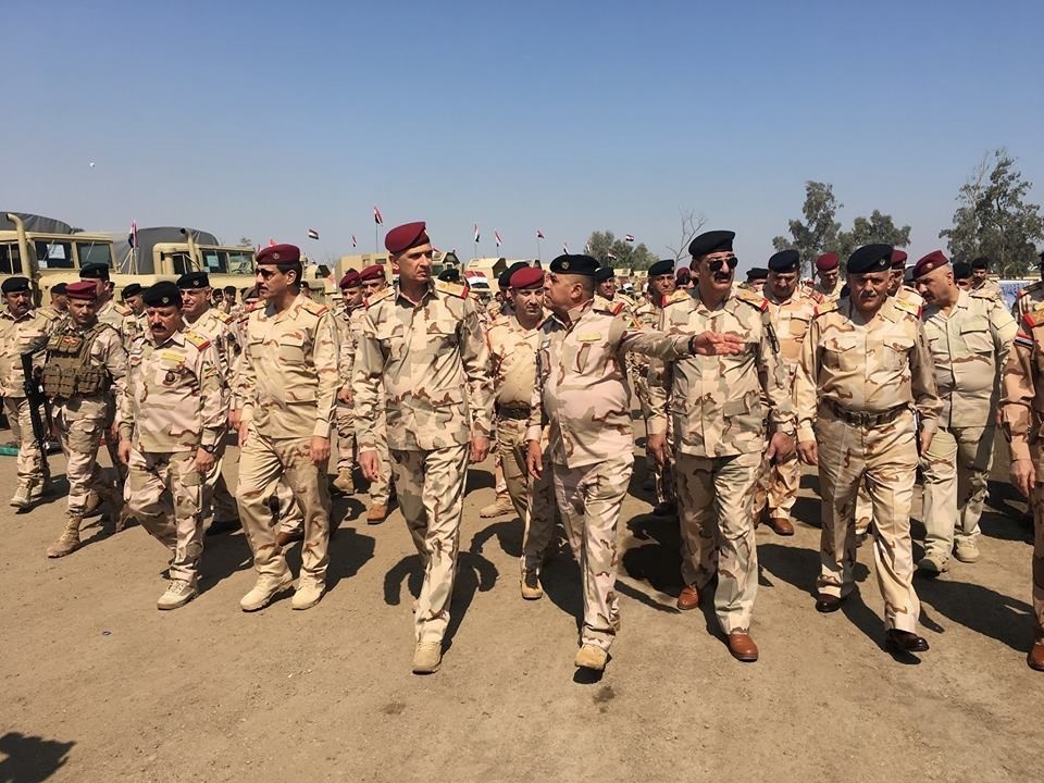 The Iraqi minister of defense, Iraqi Army chief of staff, and the 9th Iraqi Armored Division commander