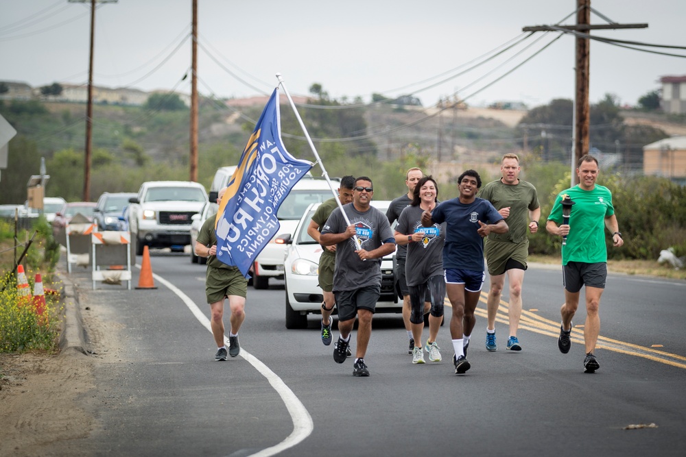Passing the torch in honor of the Special Olympics