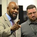 DLA RDT Red Team deputy commander Archie Turner (left) and RDT Red Team operations officer Taylor Frazier III address Troop Support employees during a humanitarian relief and disaster recovery exercise May 22 in Philadelphia.