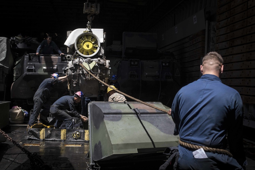 AAV Marines replace engine on ship