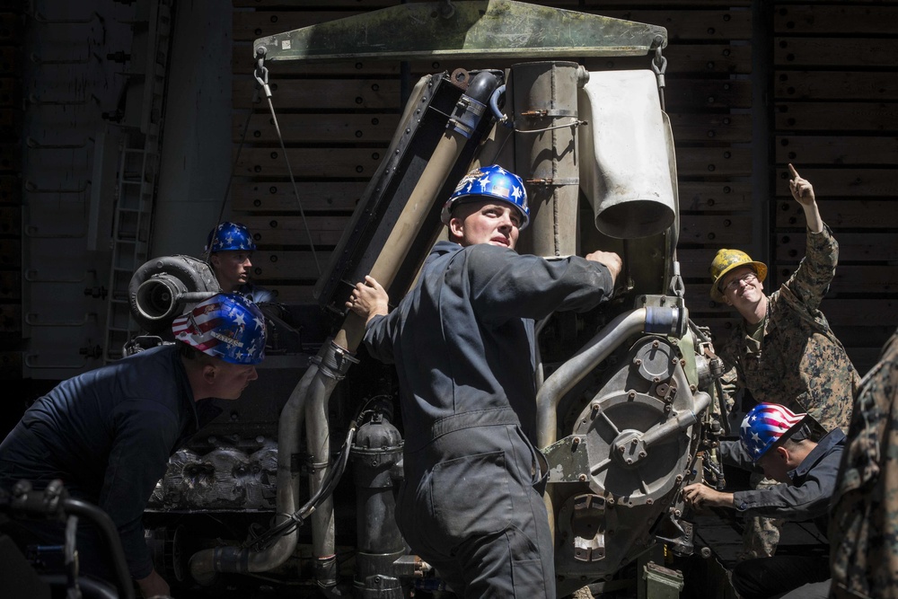 AAV Marines replace engine on ship