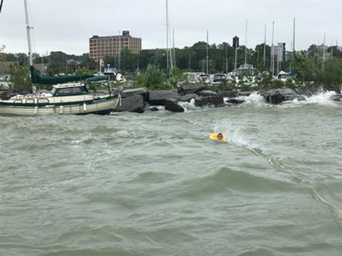 Coast Guard rescues 3 after vessel drifts into breakwall in Cleveland