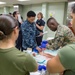Service members participate in TCCC aboard USNS Mercy