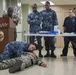 Service members participate in TCCC aboard USNS Mercy