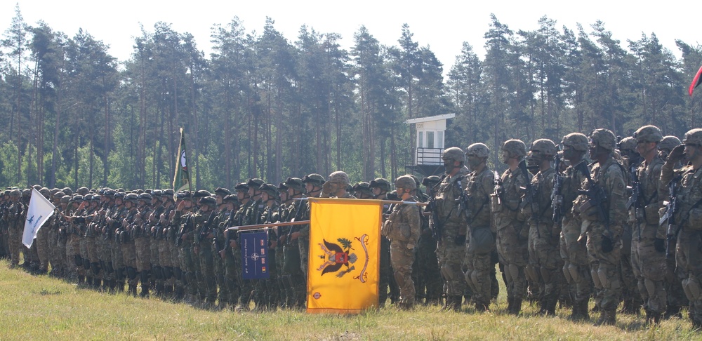 NATO Enhanced Presence Battle Group Poland Soldiers participate in the opening ceremony of Saber Strike 18