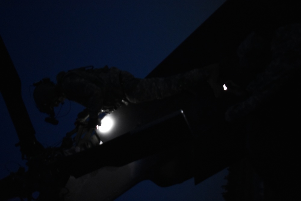 Soldiers from the 3-142 conduct Aerial Gunnery Training