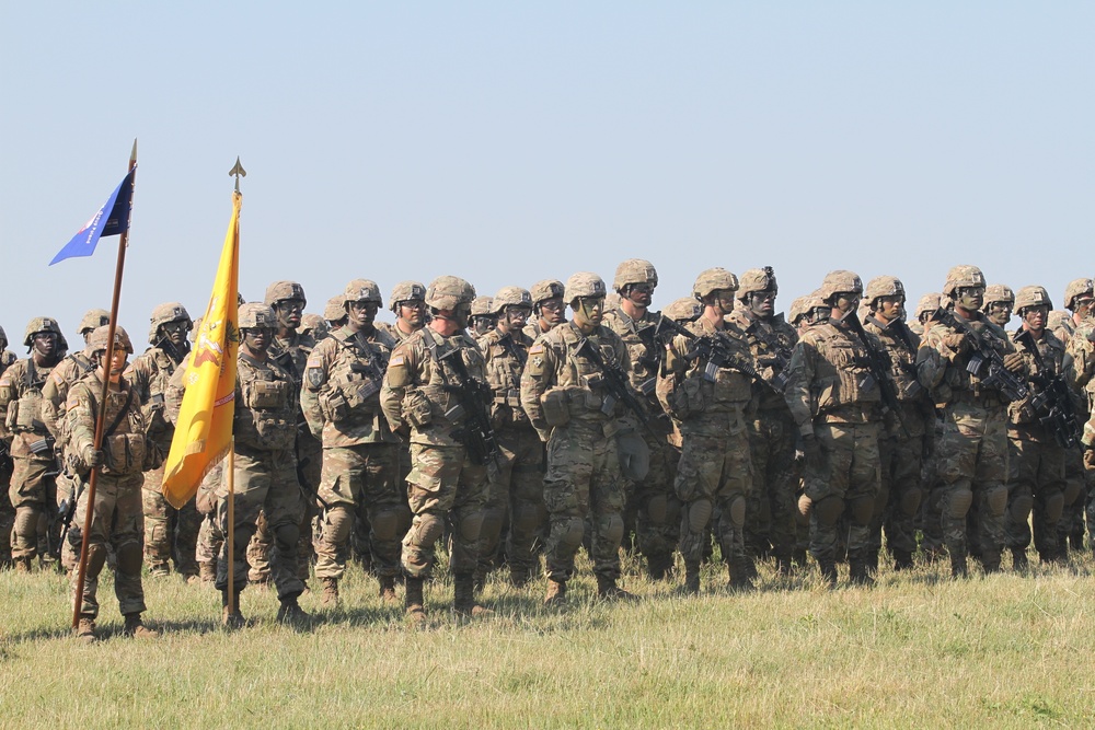 U.S. Army Soldiers participate in the opening ceremony of Saber Strike 18