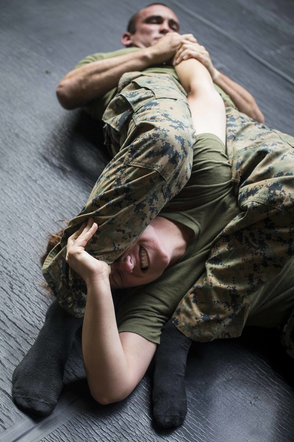 Combat Logistics Battalion 13 and Battalion Landing Team 3/1 practice grappling techniques