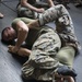 Combat Logistics Battalion 13 and Battalion Landing Team 3/1 practice grappling techniques