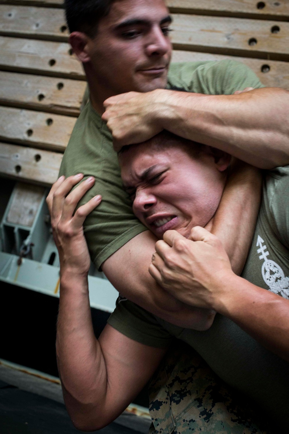 Combat Logistics Battalion 13 and Battalion Landing Team 3/1 practice grappling techniques