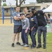 USS America Sailors participate in children's sports day event
