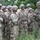 Polish soldier gives direction to U.S. Army soldiers from Battle Group Poland
