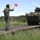 Polish soldier guides U.S. Army Stryker