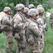 Polish soldier gives direction to U.S. soldiers during Saber Strike 18