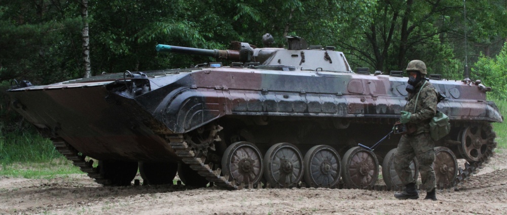 Battle Group Poland conducts chemical decontamination training at Saber Strike 18