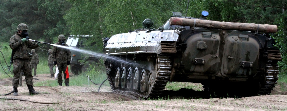 Battle Group Poland conducts chemical decontamination training at Saber Strike 18