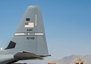 Fly Away Security Team Provides Security for a C-130 while Loading and Unloading Equipment