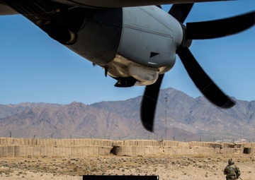 Fly Away Security Team Provides Security for a C-130 while Loading and Unloading Equipment
