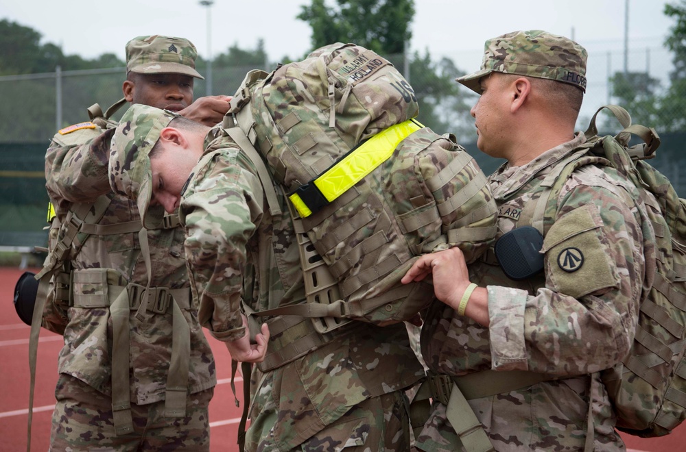 KMC service members pick up rucks in remembrance