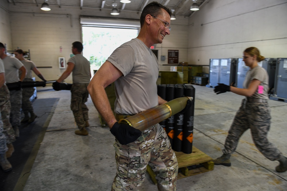 1st SOW commander builds 105mm rounds with Ammo Airmen