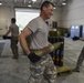 1st SOW commander builds 105mm rounds with Ammo Airmen