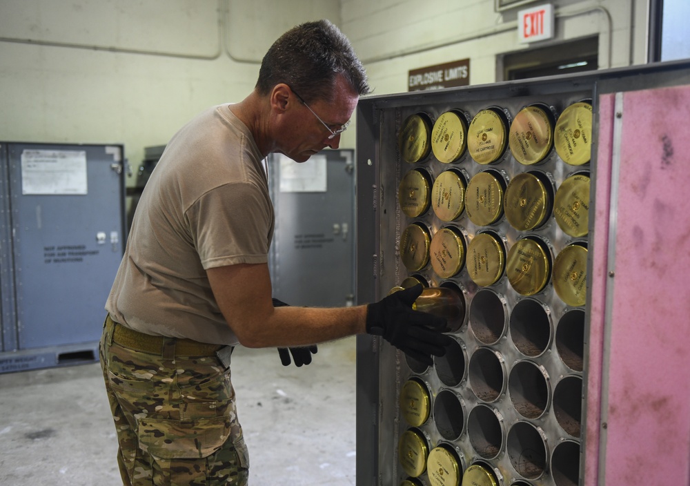 1st SOW commander builds 105mm rounds with Ammo Airmen