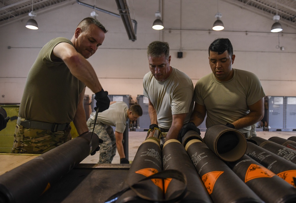 1st SOW commander builds 105mm rounds with Ammo Airmen