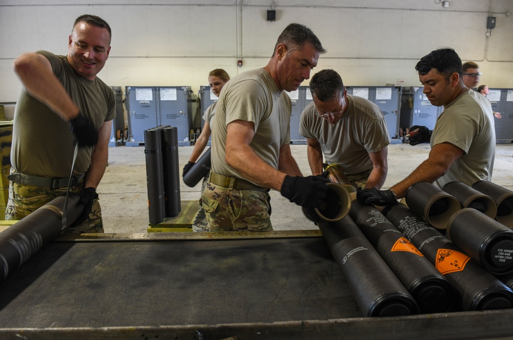 1st SOW commander builds 105mm rounds with Ammo Airmen