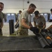 1st SOW commander builds 105mm rounds with Ammo Airmen