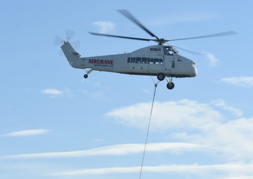 Helicopter moves 57 air conditioning units to roof of Bldg 3001.