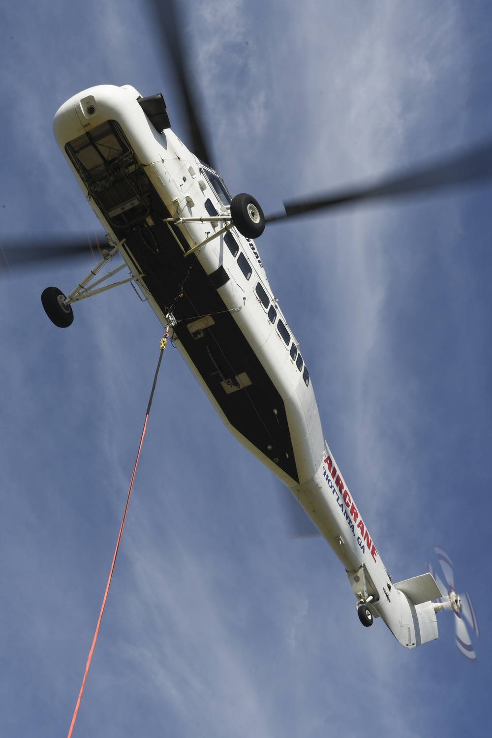 Helicopter moves 57 air conditioning units to roof of Bldg 3001.