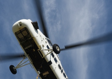 Helicopter moves 57 air conditioning units to roof of Bldg 3001.