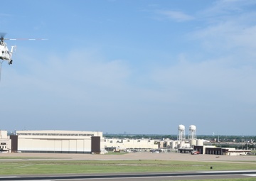 Helicopter moves 57 air conditioning units to roof of Bldg 3001.
