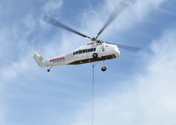 Helicopter moves 57 air conditioning units to roof of Bldg 3001.