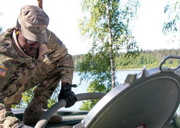 226th CSC Soldiers Provide Purified Water For Saber Strike 18
