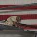 Black Hawk Mechanics Work on Aircraft