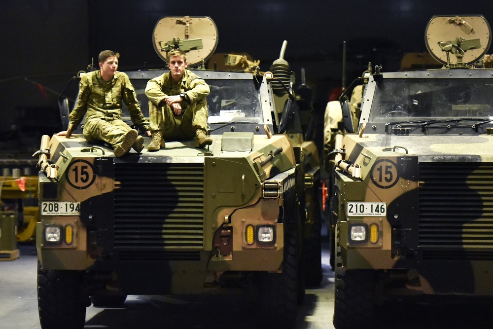 Australian Defence Force moves vehicles from ship to shore