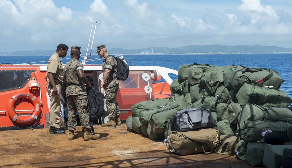 Service Members disembark USNS Mercy in Okinawa